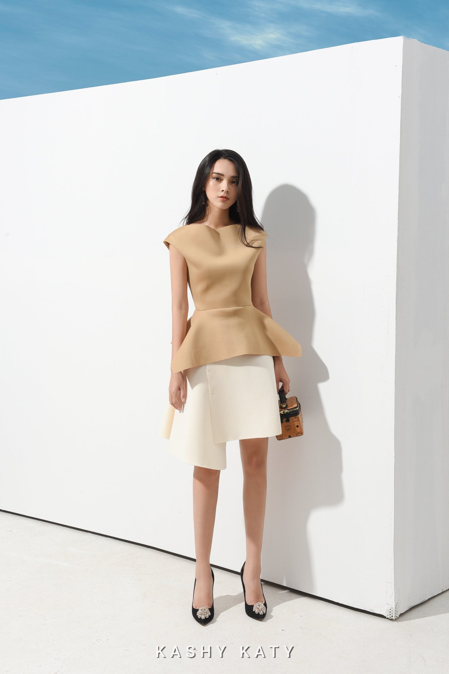 Elsa Modern Sleeveless Peplum Blouse - Image 4